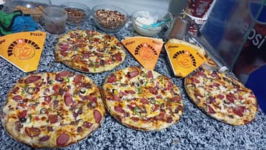مطعم حور للبيتزا والفطير والكريبات