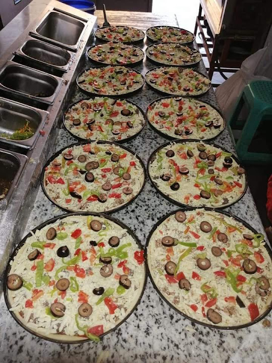 بيتزا و فطائرالزعيم