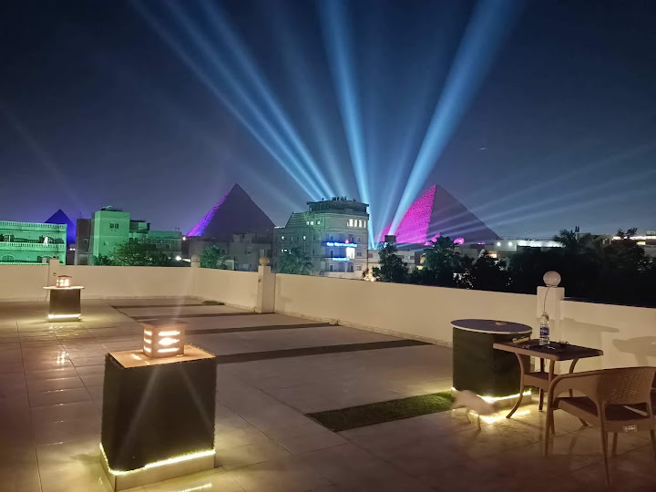 Nefertiti Pyramids View