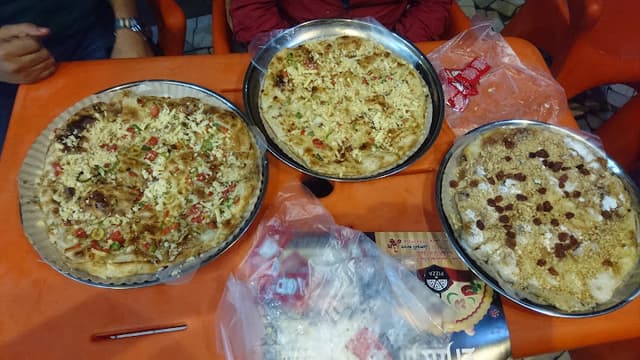 مطعم فطائر وبيتزا الزهراء