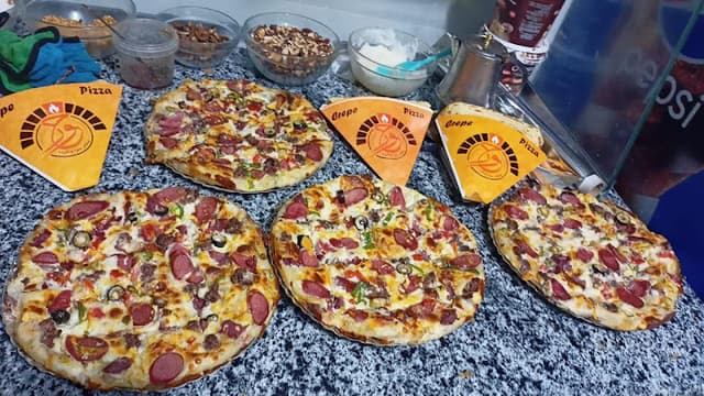 مطعم حور للبيتزا والفطير والكريبات