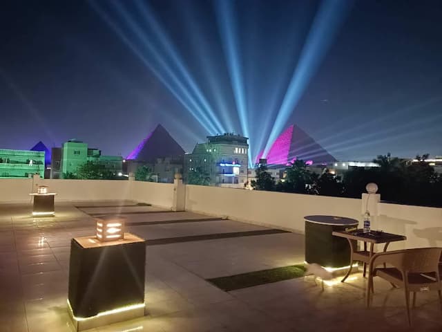 Nefertiti Pyramids View